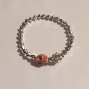 Silver Beaded Ring with Orange Skull and Silver Pave Accents